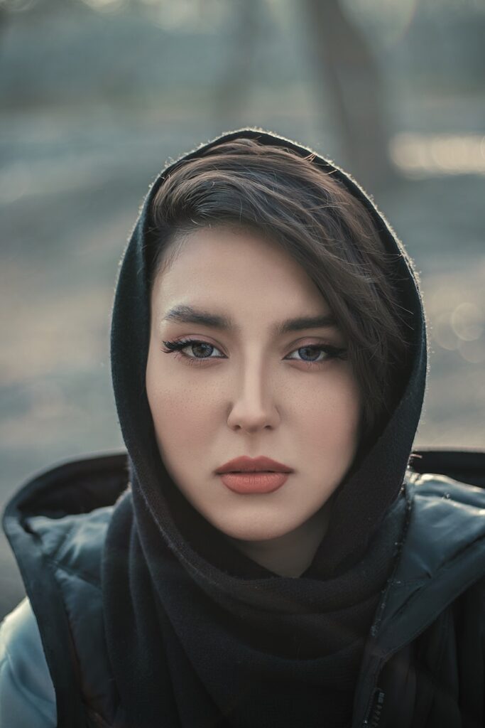 a woman with a scarf on her head